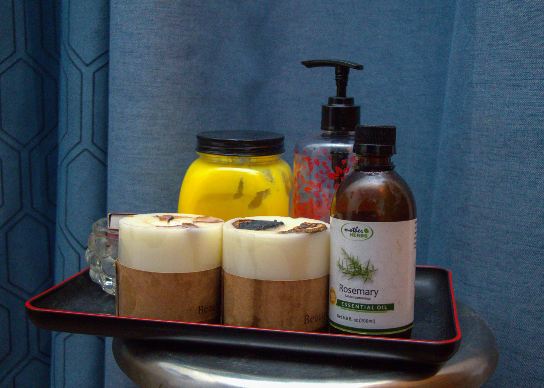 Herbal massage oils and candles used in Beckindales treatment rituals